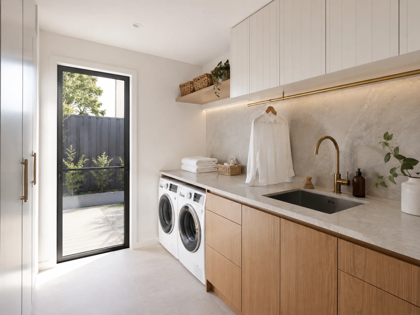 Laundry inspiration with timber storage and a long working bench
